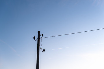 Electric pole telephone cable post sky blue clouds copy space