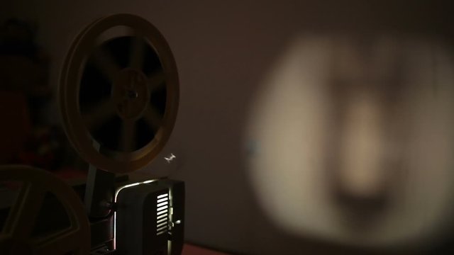Retro movie projector. Old movie projector for watching 8 mm film films