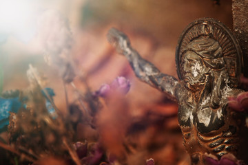 Fragment of ancient statue crucifixion of Jesus Christ as divine savior of the world.