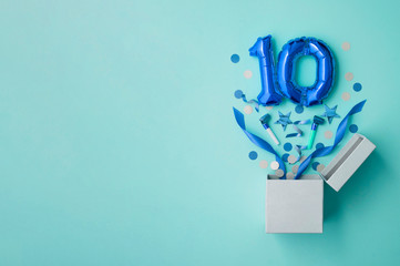 Number 10 birthday balloon celebration gift box lay flat explosion - obrazy, fototapety, plakaty