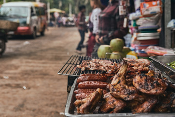 chicken wings in street food market in cambodia
