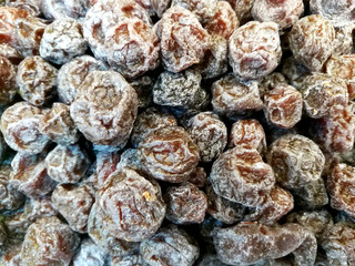 Close up a pile of sweet dried plum