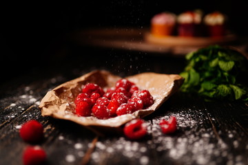 Raspberries in powdered sugar