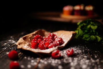 Raspberries in powdered sugar
