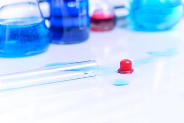 Spilled blue liquid on the lab table in the lab. Violation of quarantine security.Danger of infection.