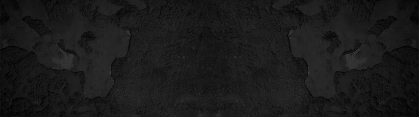 Dark black anthracite grey old damaged rustic weathered concrete plaster stone facade texture background banner panorama