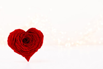 Red rose heart shaped. Valentine or Wedding background.