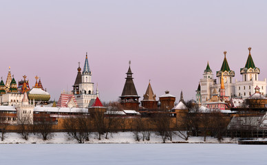 winter frosty morning with a view of the lake and the ancient fortress