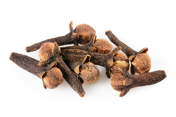 Cloves spice. Some dried cloves, macro close-up Isolated on white background, with light shadow.