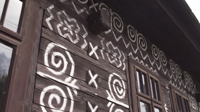 Decorated Timber cottage in Cicmany village, Slovakia