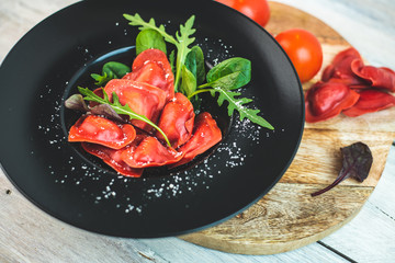red, heart-shaped tomato ravioli