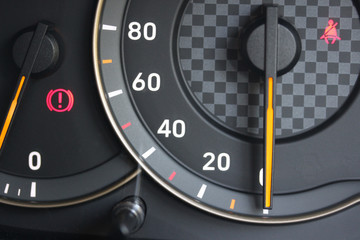 speedometer on black background