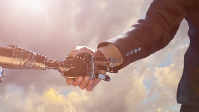 a businessman in a suit and a robot shaking hands. Gray wall background. Concept of innovation in business,3d rendering