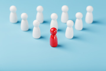 The leader in red leads a group of white employees to victory, HR, Staff recruitment. The concept of leadership.