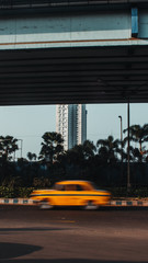 Moving car and building