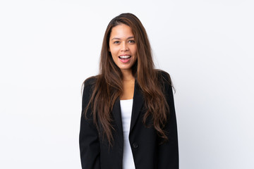 Young Brazilian girl with blazer over isolated white background with surprise facial expression