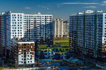 Modern houses with comfortable, secure courtyards without cars. Technology is a smart city with a security system and energy-saving LED street lighting. Saint Petersburg, Russia, May 1, 2019