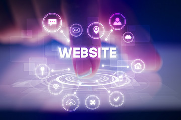 Finger touching tablet with web technology icons and WEBSITE inscription, web technology concept