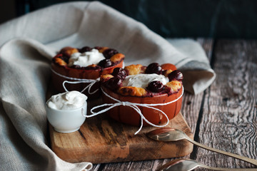 Cottage cheese casserole with cherry and sour cream