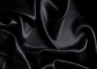 Obraz premium Satin black silk background, close-up