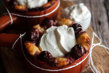 Cottage cheese casserole with cherry and sour cream