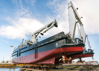 Modern ship in the shipyard getting ready for launch