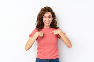 Young pretty woman over isolated background with surprise facial expression