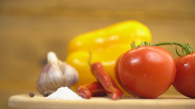 tomatoes, peppers and garlic on a tray
