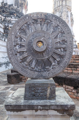  1Intricate carvings on a stone wheel in the ancient Surya Hindu..