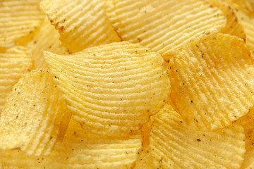 food background of fluted chips with dill
