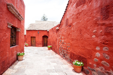 Inner streets in monastery Santa Catalina, Arequipa, Peru, old wall terracotta color.