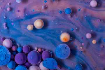 Bright and colourful abstract background from acrylic paints and oil