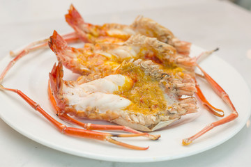 Grilled river prawn on white plate