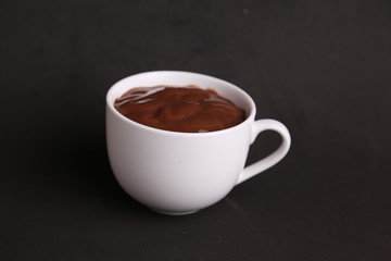 white cup of delicious chocolate