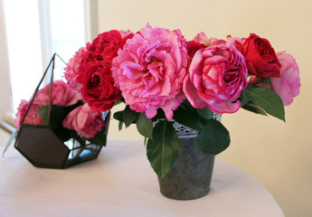 lush pink peonies in a  vase composition with peonies romantic bouquet