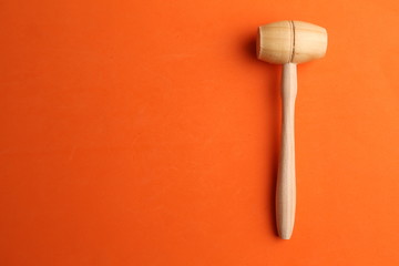 small wooden mallet made of pine wood