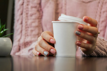 young woman drinking coffee