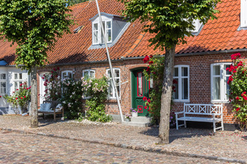 Traditional red brick house in historic town Mogeltonder, Denmark