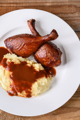 Barbecue duck legs with mashed potato