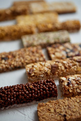 Homemade gluten free granola bars with mixed nuts, seeds, dried fruits