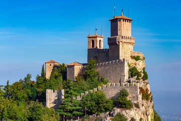 Fototapeta na wymiar San Marino. Old stone towers on top of the mountain.