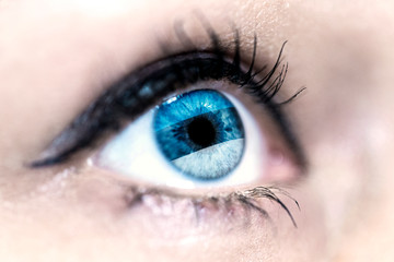 Flag of Estonia reflects in a woman blue eye - election, sport, hope, young, generation, pride, dream, emotion, independance	