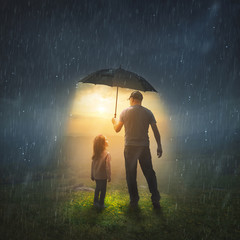 Father and Daughter in the Rain - 321680598