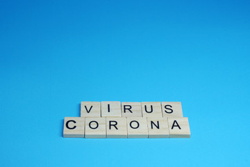 Virus Corona - Wood object word on Blue Background and copy space - Virus outbreak Concept 