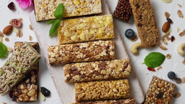 Homemade gluten free granola bars with mixed nuts, seeds, dried fruits