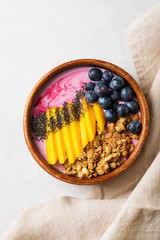 Asai bowl granola oatmeal with mango, blueberry and chia seeds