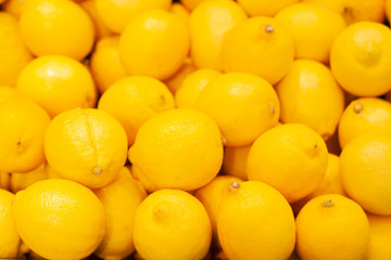 Lots of ripe lemons in the supermarket