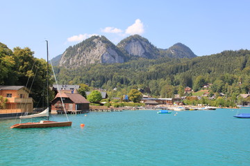 boats and houses on the lake
