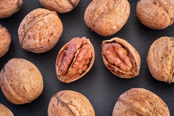 Walnuts on a black background