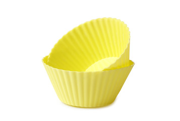 silicone mold for baking on a white background. Culinary accessories of the baker. Small baking cups. It is isolated.